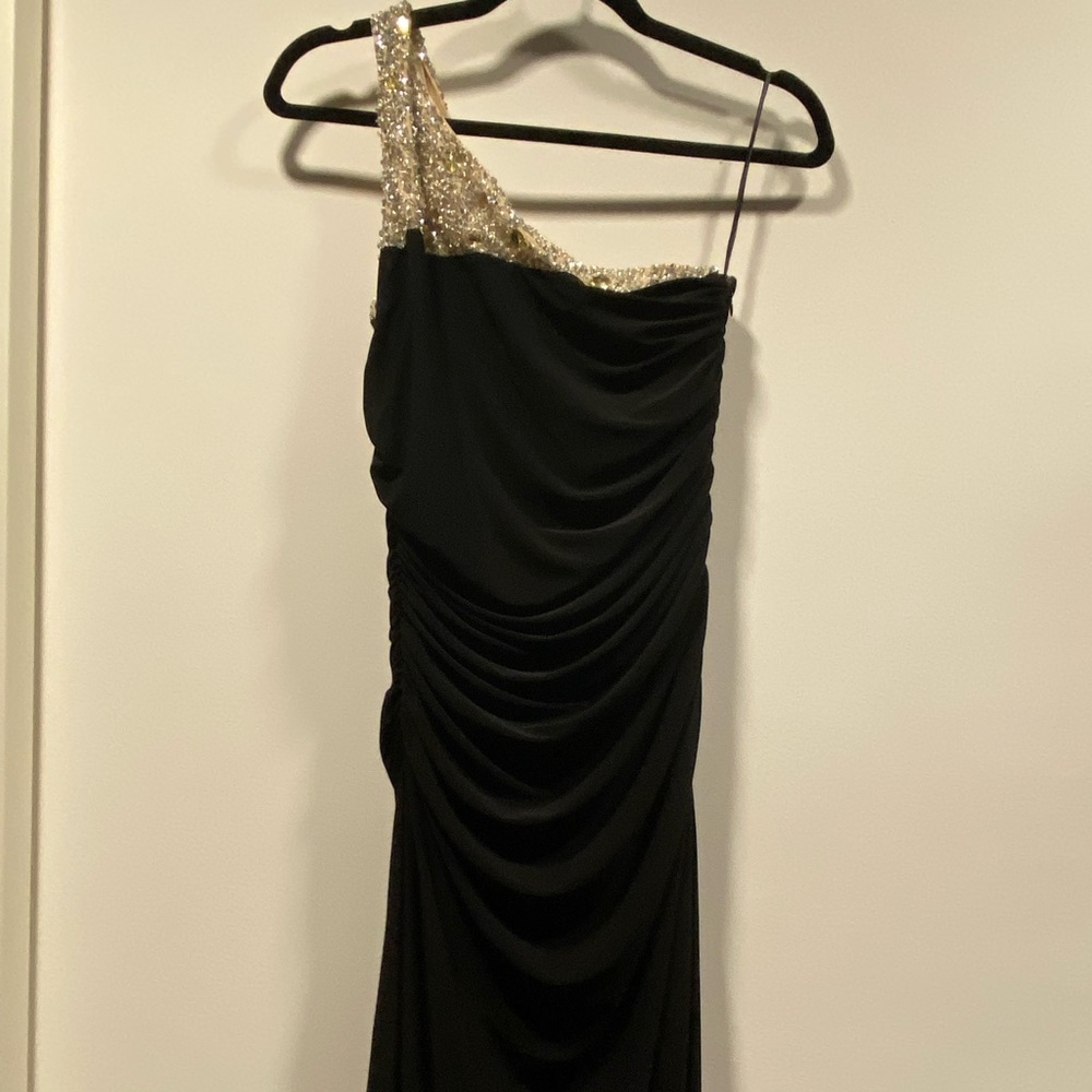 Cache long formal dress with beautiful bead work at the top